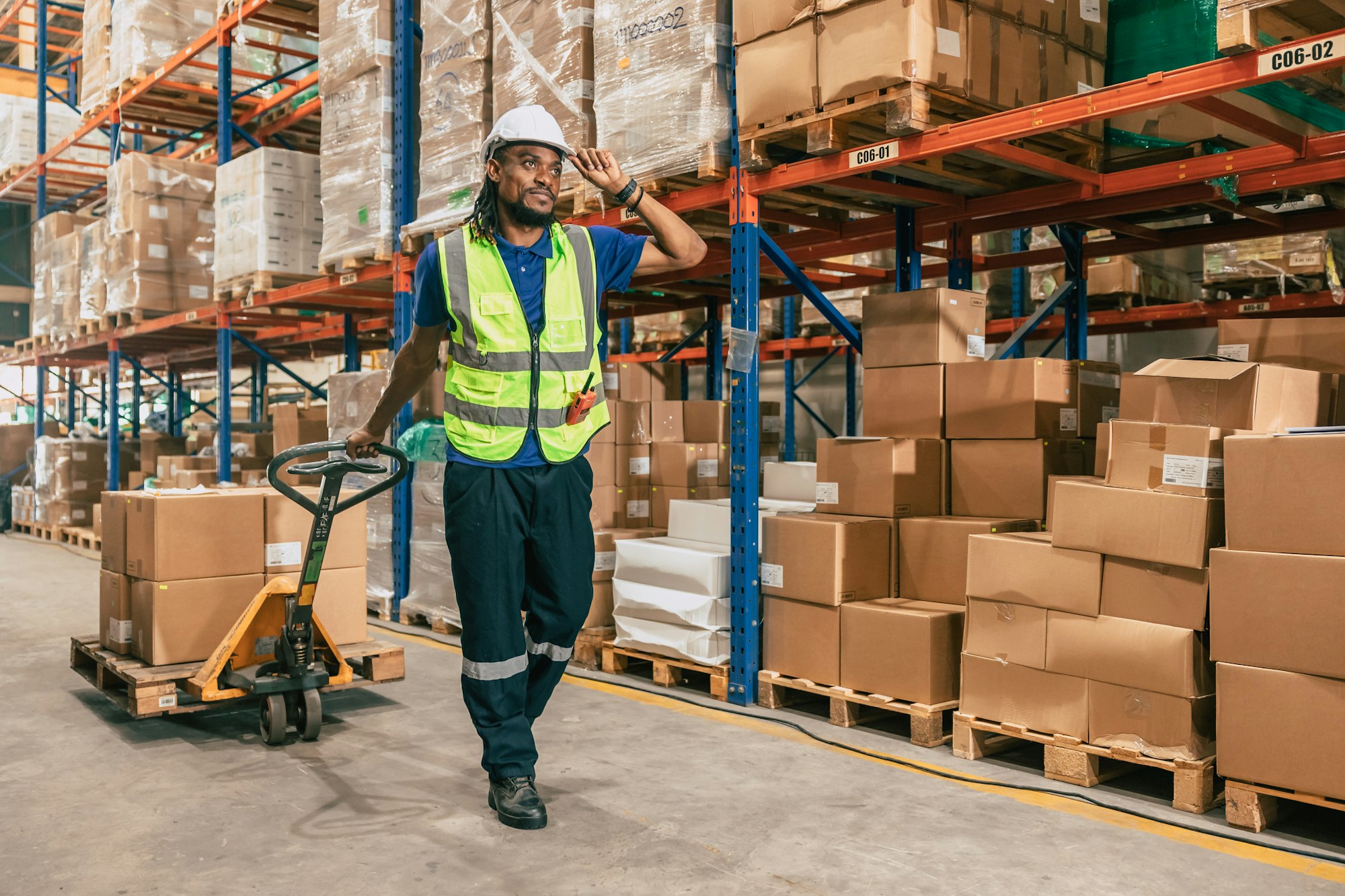 Warehouse worker handling parcels in a logistics operation