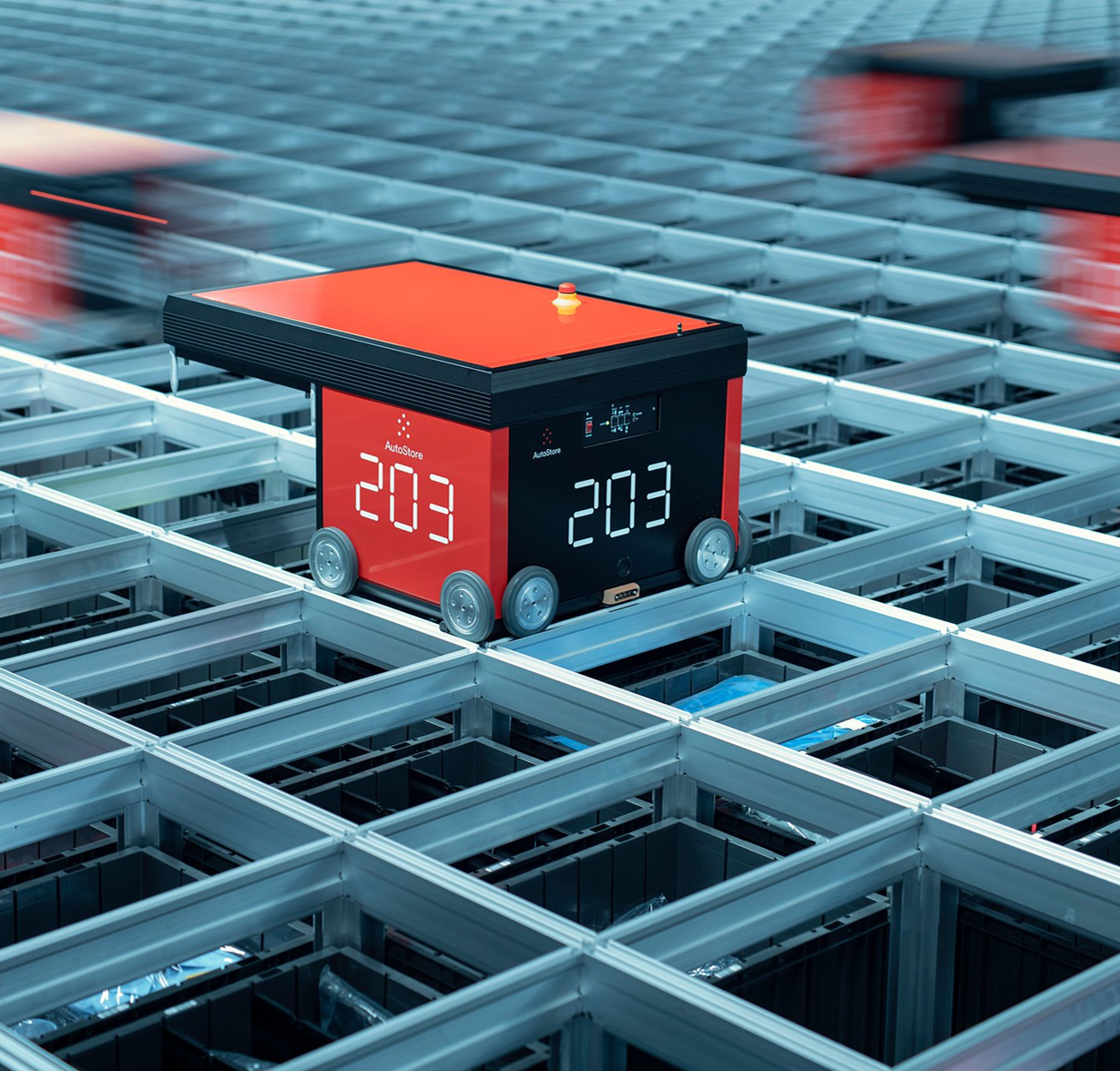 AutoStore robot retrieving a bin in the automated warehouse